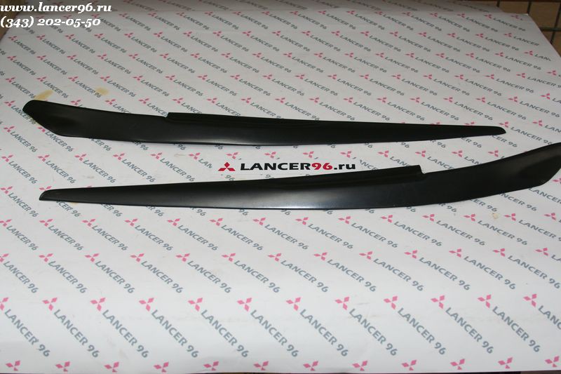 Накладки (реснички) на фары Lancer X